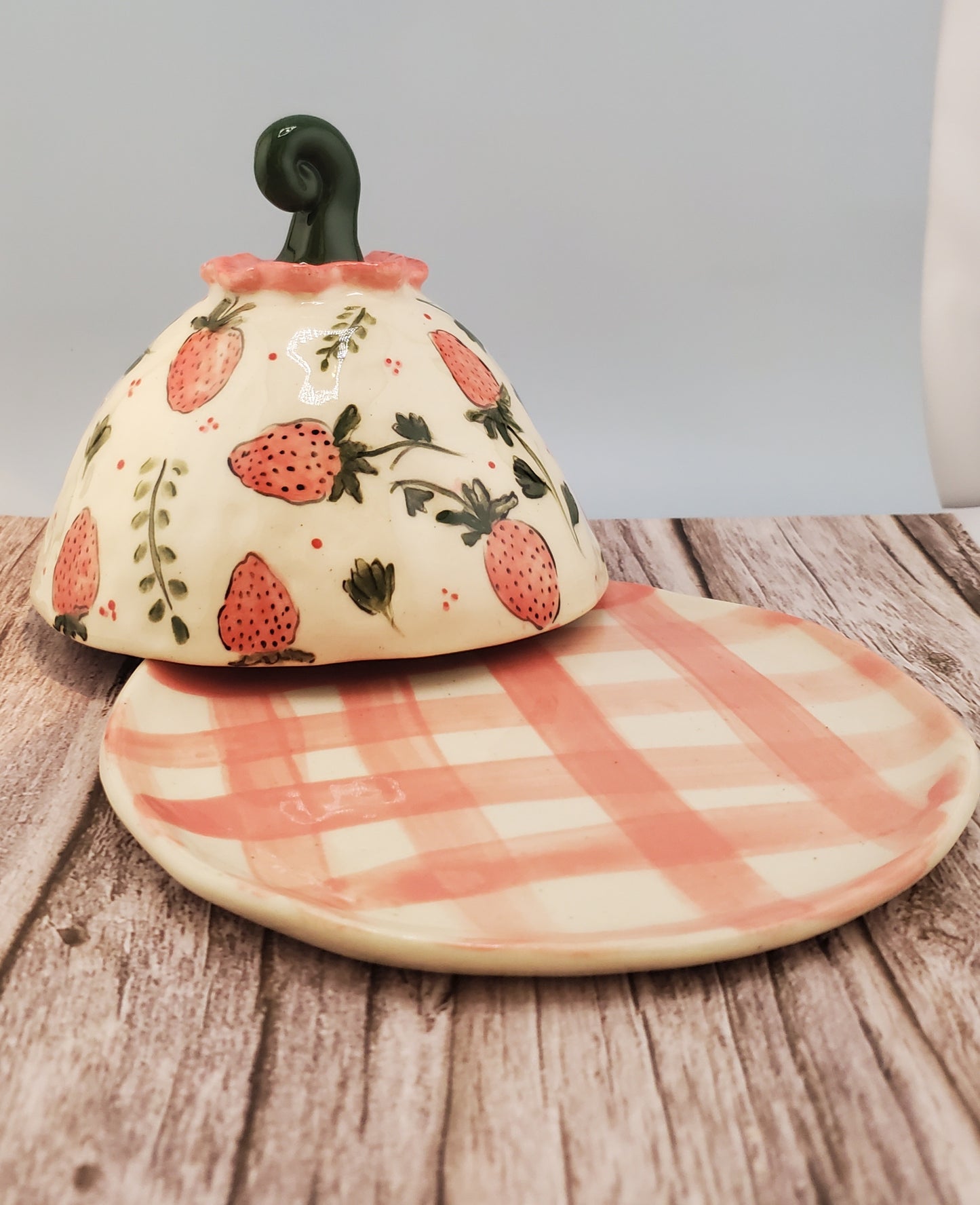 Strawberry cheese dome with gingham plate