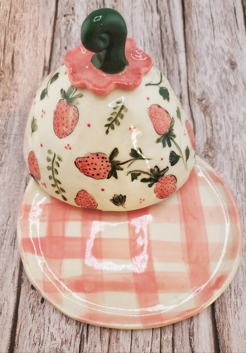 Strawberry cheese dome with gingham plate