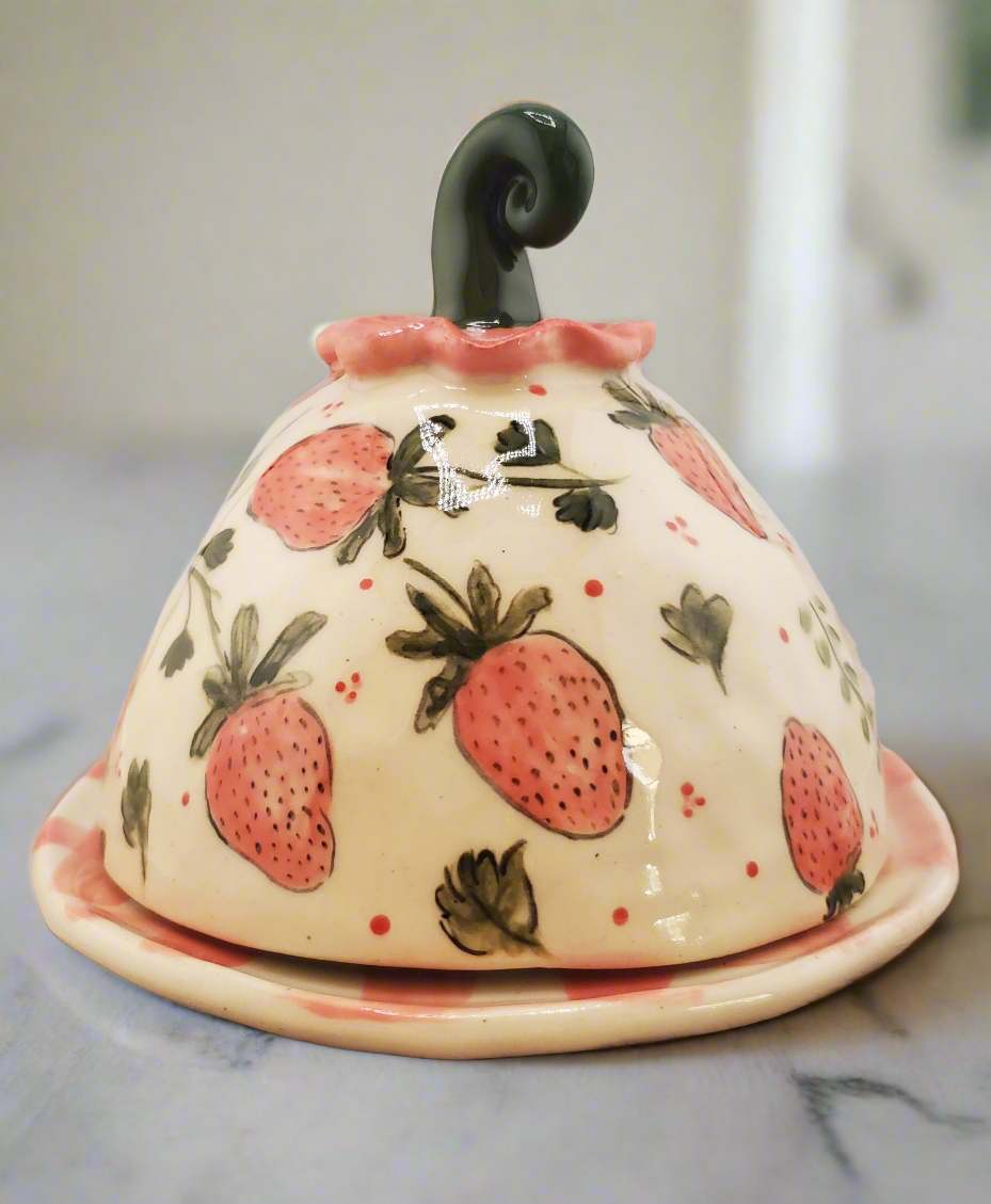 Strawberry cheese dome with gingham plate