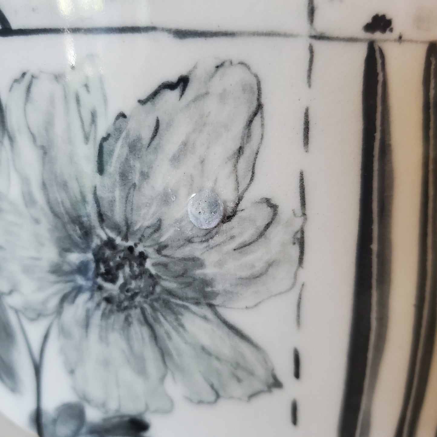 Black and white vase with glaze flaw
