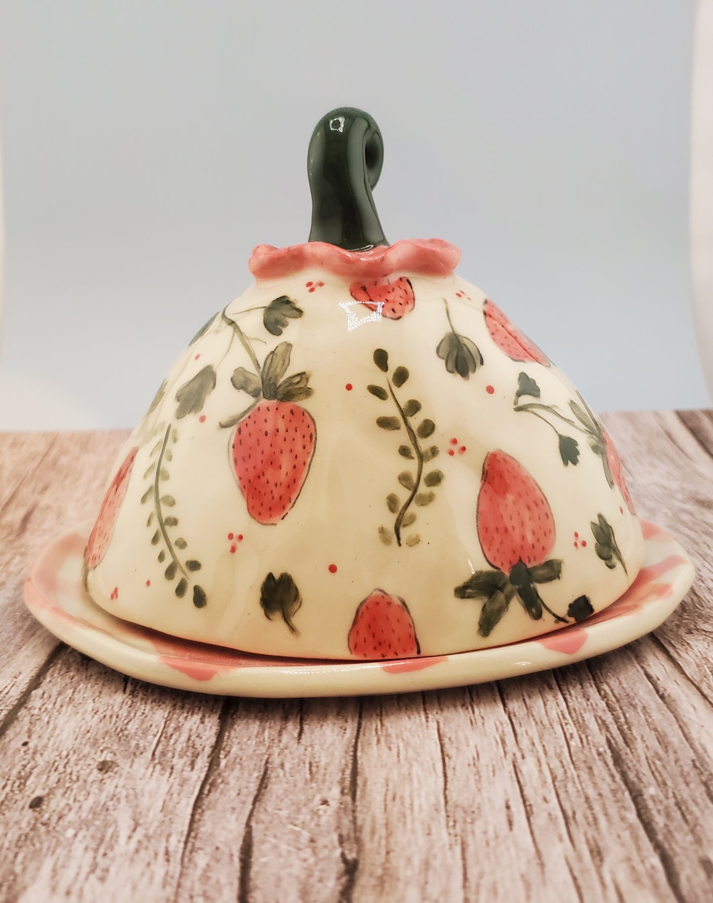 Strawberry cheese dome with gingham plate