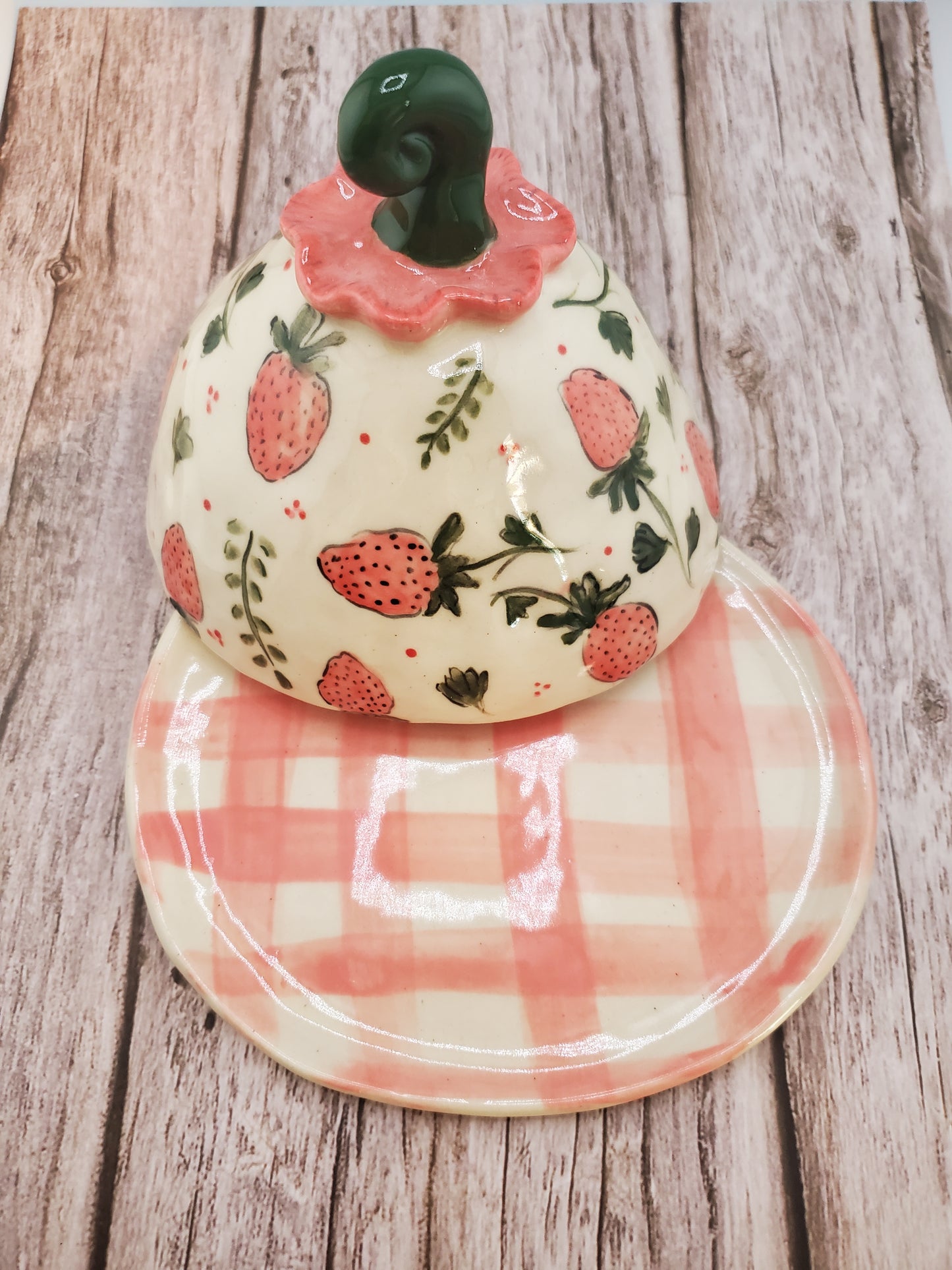 Strawberry cheese dome with gingham plate
