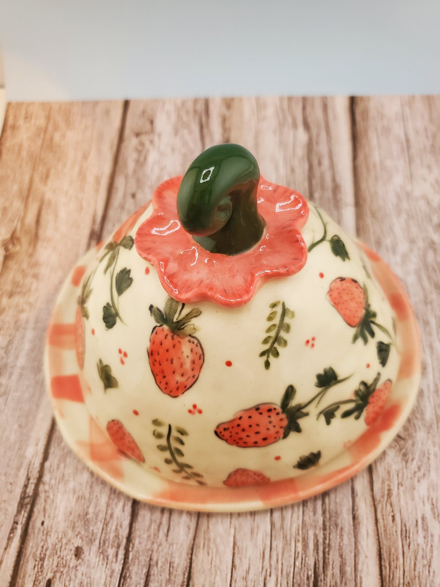 Strawberry cheese dome with gingham plate