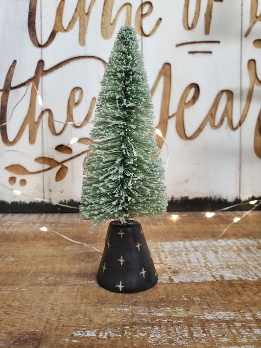 Bottle brush tree and ceramic swiss cross stand